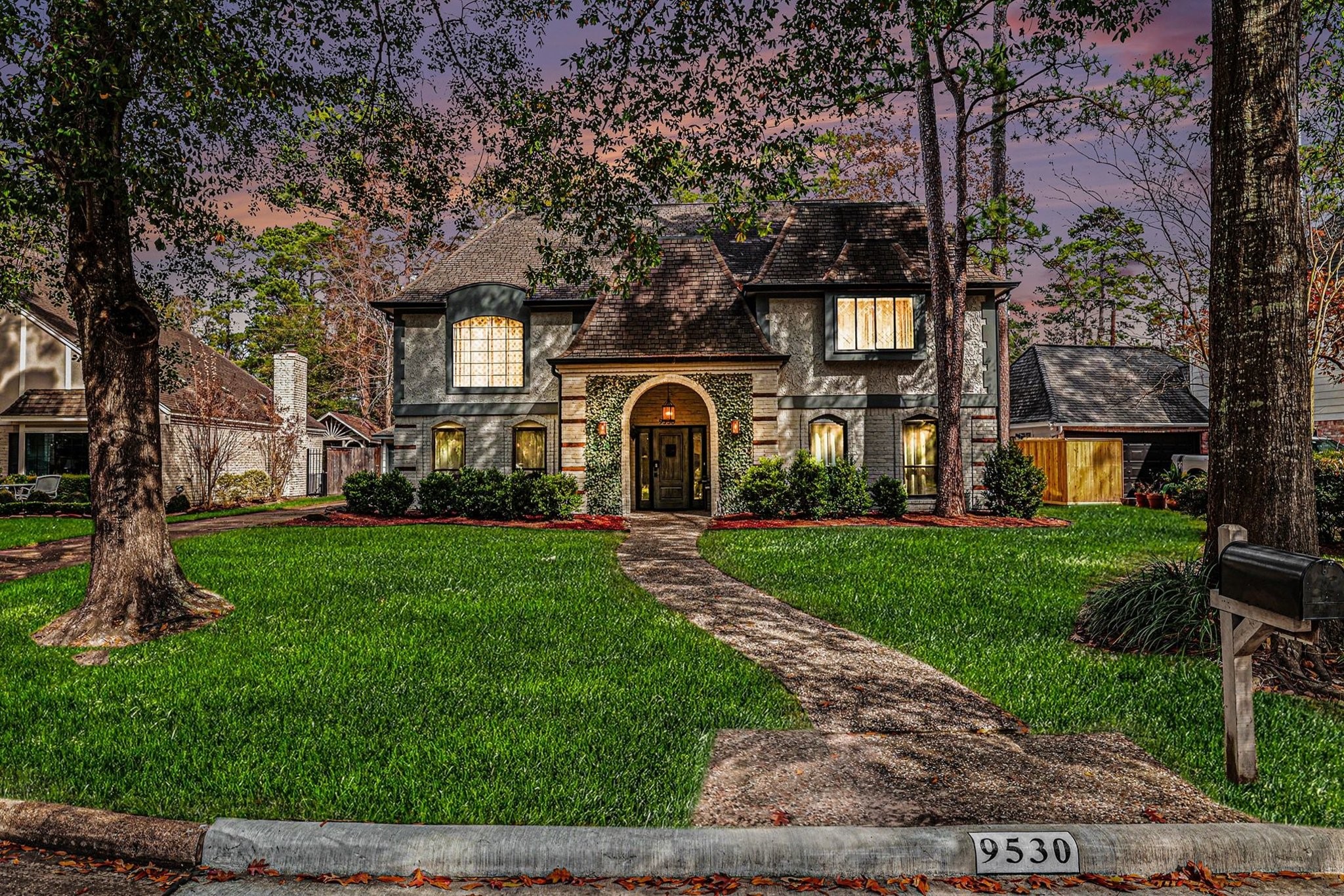 9530 Arcade Drive Spring, TX 77379 - Photo 4 of 37 Twilight view of this spectacular home!