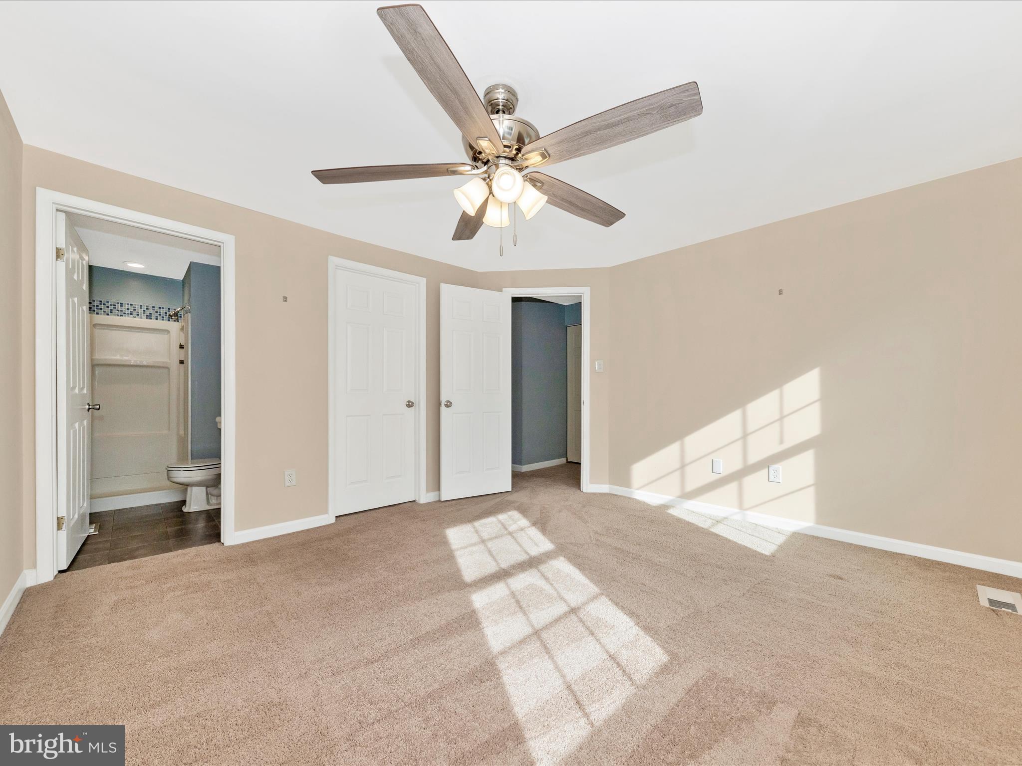 17634 Kohlhoss Road Poolesville, MD 20837 - Photo 21 of 44 a view of a big room with a ceiling fan and entryway
