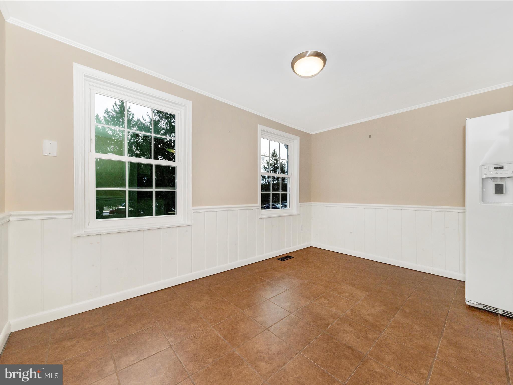 17634 Kohlhoss Road Poolesville, MD 20837 - Photo 6 of 44 an empty room with windows