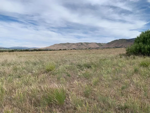 a view of an lake and mountain