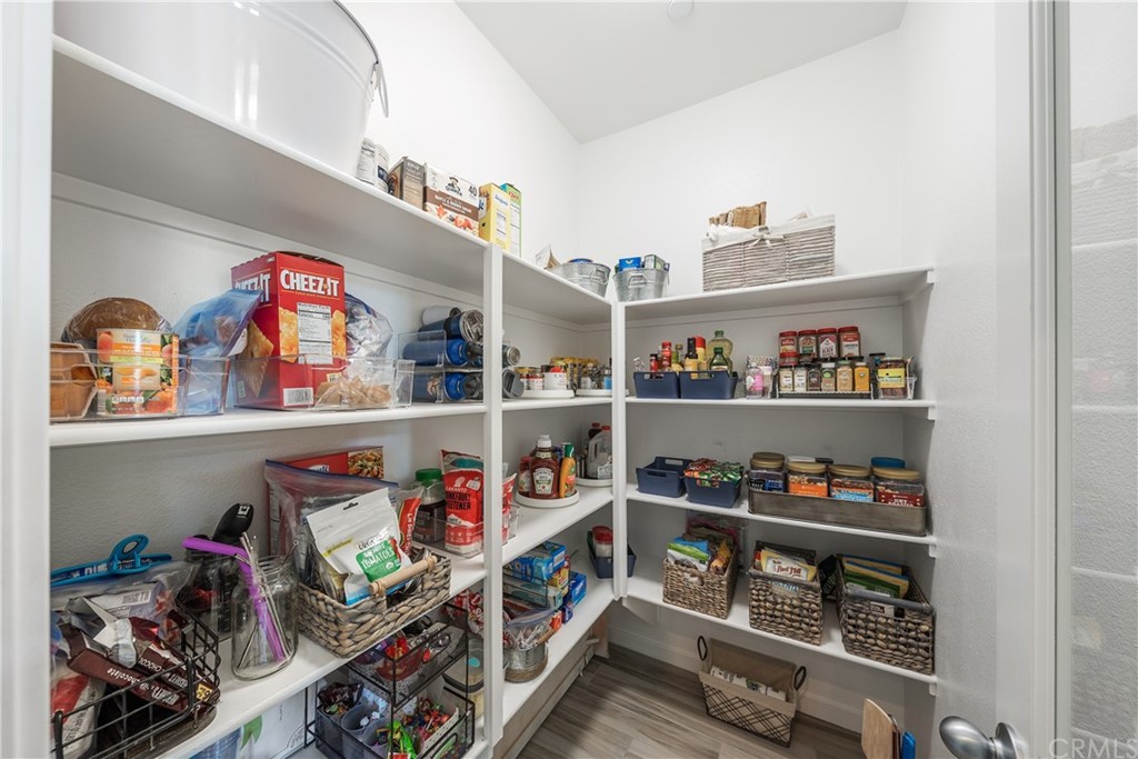 35162 Ladybug Lane Murrieta, CA 92563 - Photo 15 of 58 a shelf with books and knick knacks on it