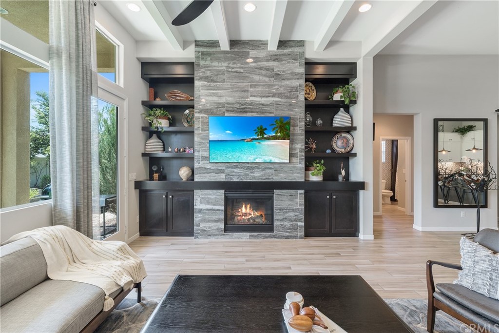 35162 Ladybug Lane Murrieta, CA 92563 - Photo 17 of 58 a living room with furniture and a fireplace