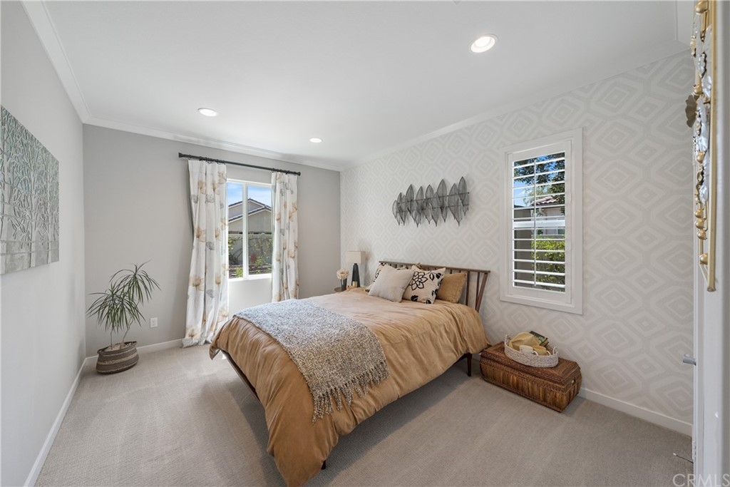 35162 Ladybug Lane Murrieta, CA 92563 - Photo 28 of 58 a bedroom with a bed and a couch