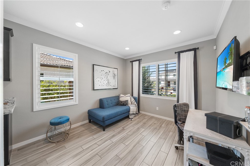 35162 Ladybug Lane Murrieta, CA 92563 - Photo 31 of 58 a living room with furniture and a flat screen tv