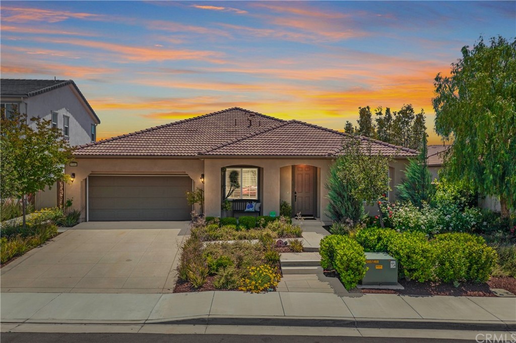 35162 Ladybug Lane Murrieta, CA 92563 - Photo 4 of 58 a front view of a house with garden