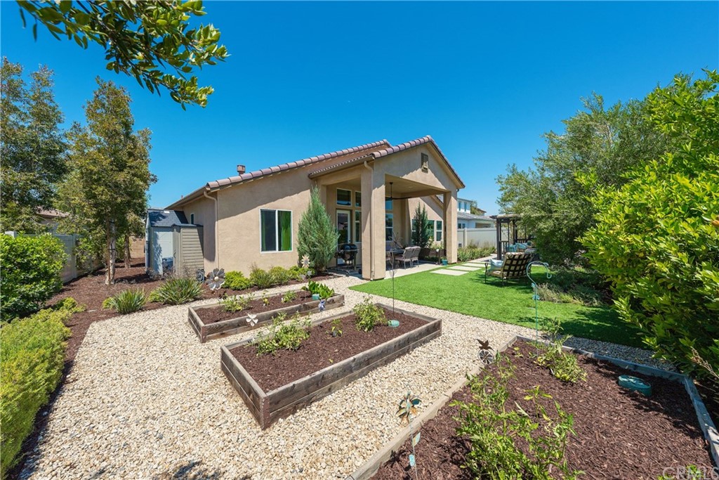 35162 Ladybug Lane Murrieta, CA 92563 - Photo 41 of 58 a view of a house with backyard and sitting area