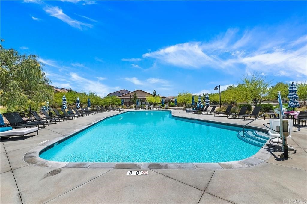 35162 Ladybug Lane Murrieta, CA 92563 - Photo 56 of 58 a view of a swimming pool and lounge chair