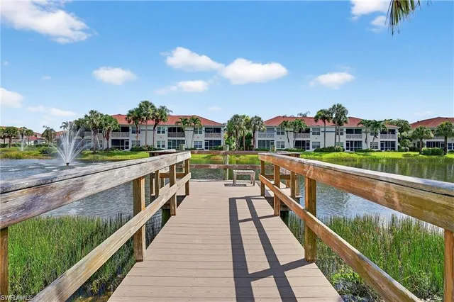 a view of a playground with basketball court