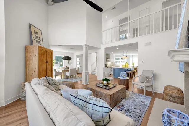 a living room with furniture and a table