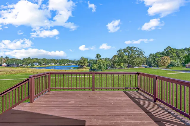 a view of a balcony with lake view