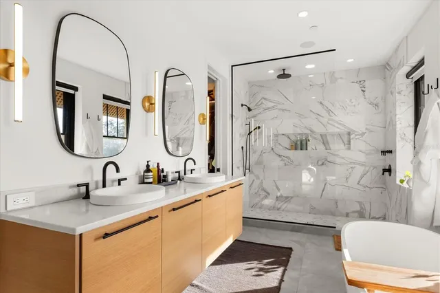 a view of a dining room with furniture and a potted plant
