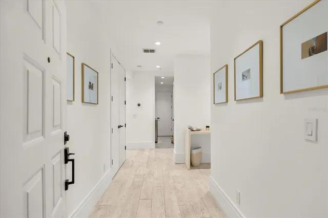 a kitchen with stainless steel appliances granite countertop a sink and cabinets