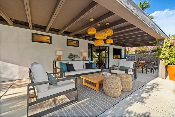 a view of a patio with swimming pool table and chairs