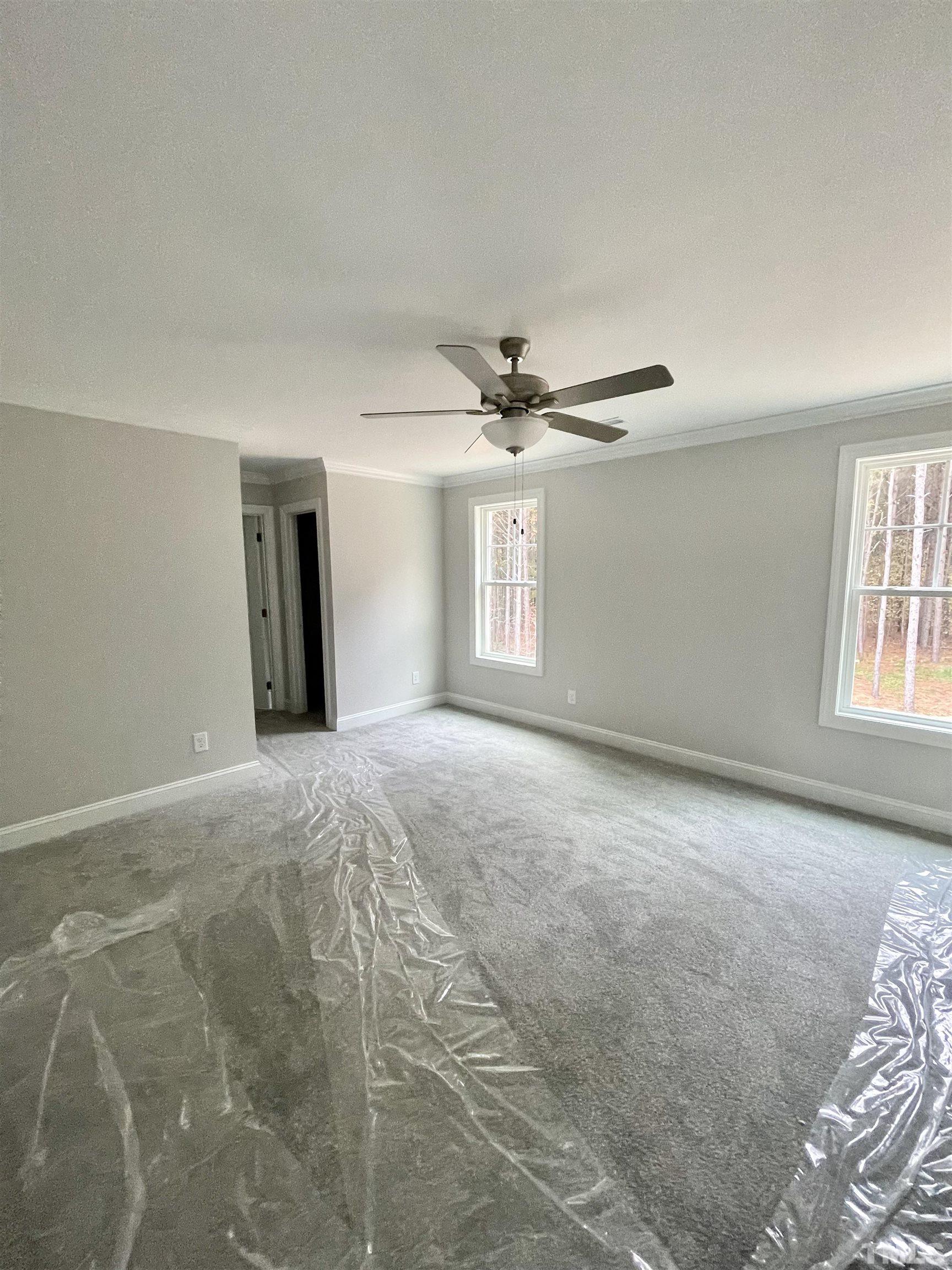 20 Mulberry Pl Spring Spring Hope, NC 27882 - Photo 11 of 18 a view of a livingroom with a ceiling fan and window
