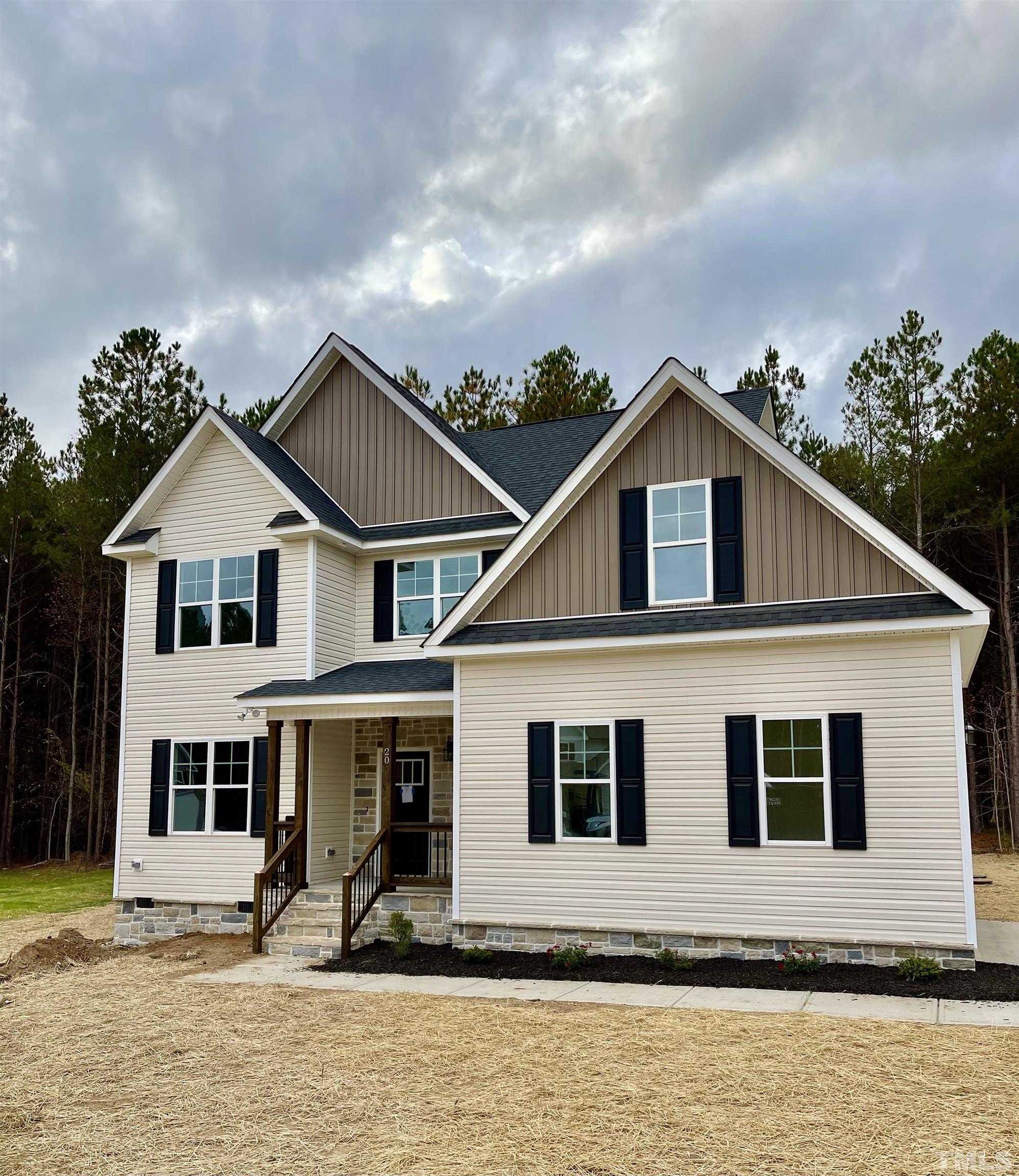 20 Mulberry Pl Spring Spring Hope, NC 27882 - Photo 3 of 18 a front view of a house with a porch