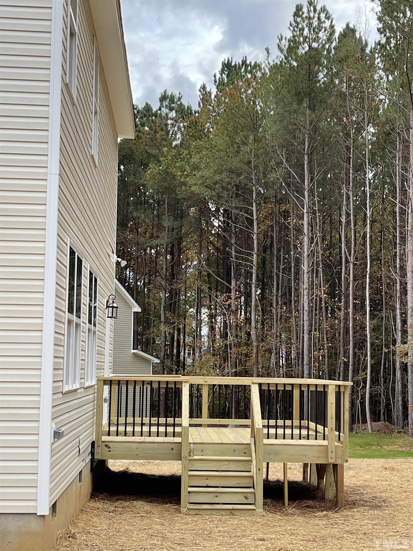 20 Mulberry Pl Spring Spring Hope, NC 27882 - Photo 5 of 18 a view of a balcony with furniture