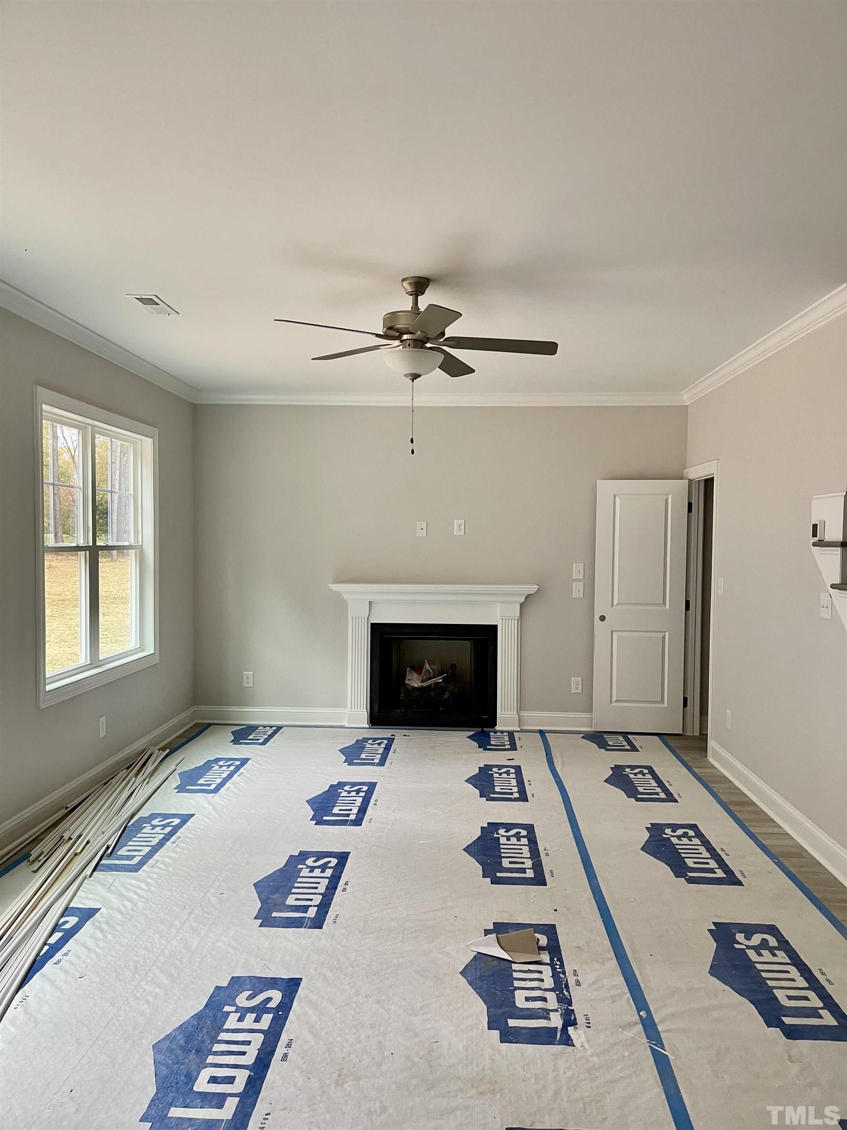 20 Mulberry Pl Spring Spring Hope, NC 27882 - Photo 7 of 18 a living room with furniture and a fireplace