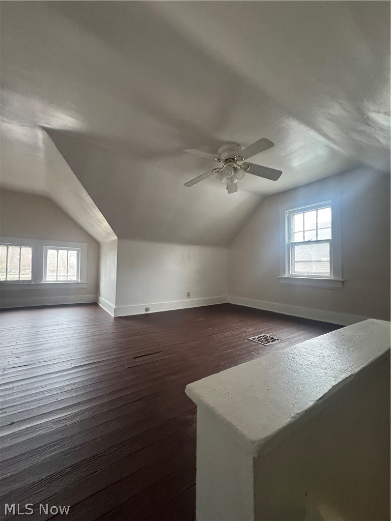 577 Rhodes Avenue Akron, OH 44307 - Photo 13 of 19 Bonus room with vaulted ceiling, dark wood-style flooring, and a ceiling fan