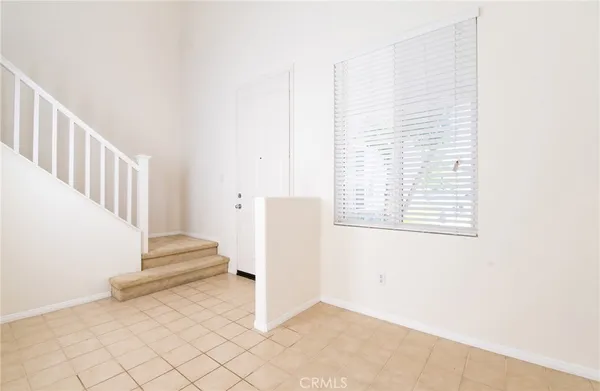 a view of entryway with stairs