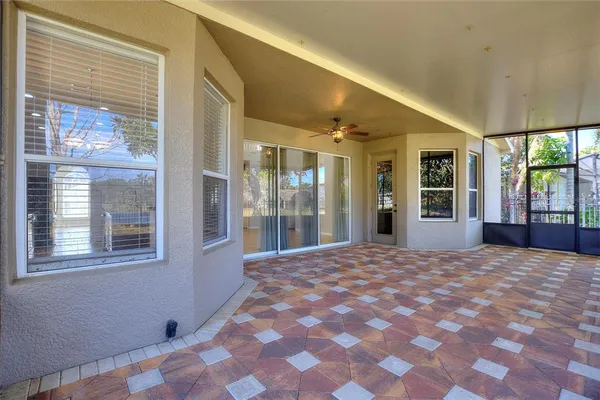 a view of an empty room with a balcony