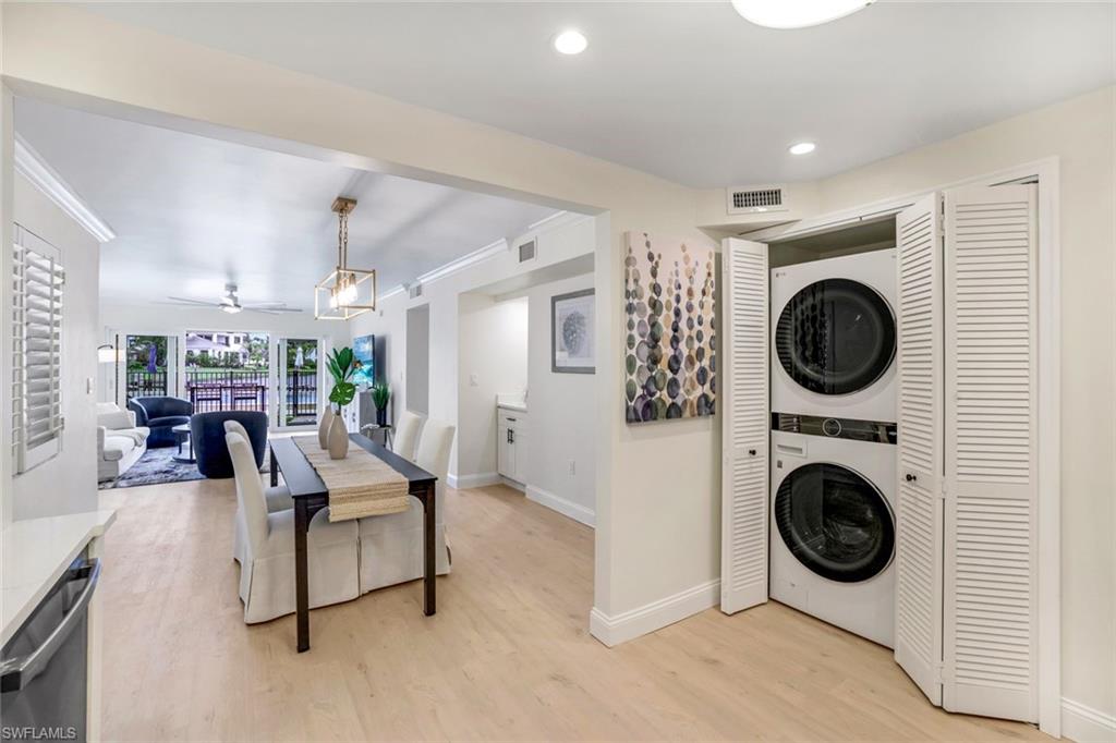4150 Crayton Road, Unit B2 Naples, FL 34103 - Photo 7 of 23 a view of living room washer and dryer