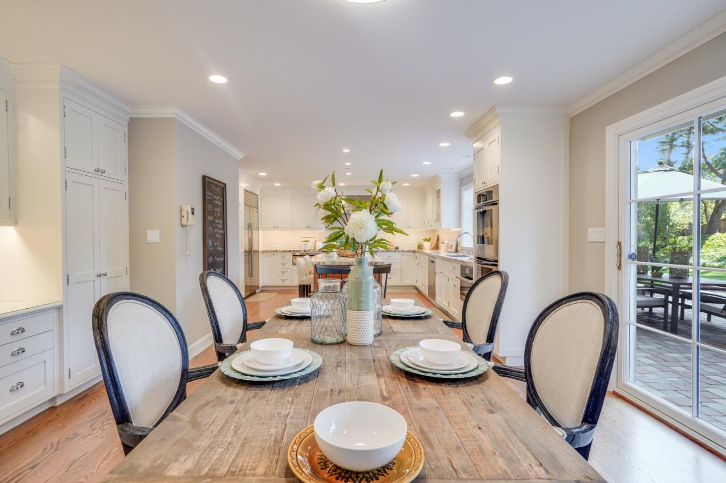 15 Joyce Road Hillsborough, CA 94010 - Photo 22 of 70 a dining room with furniture a rug and white walls