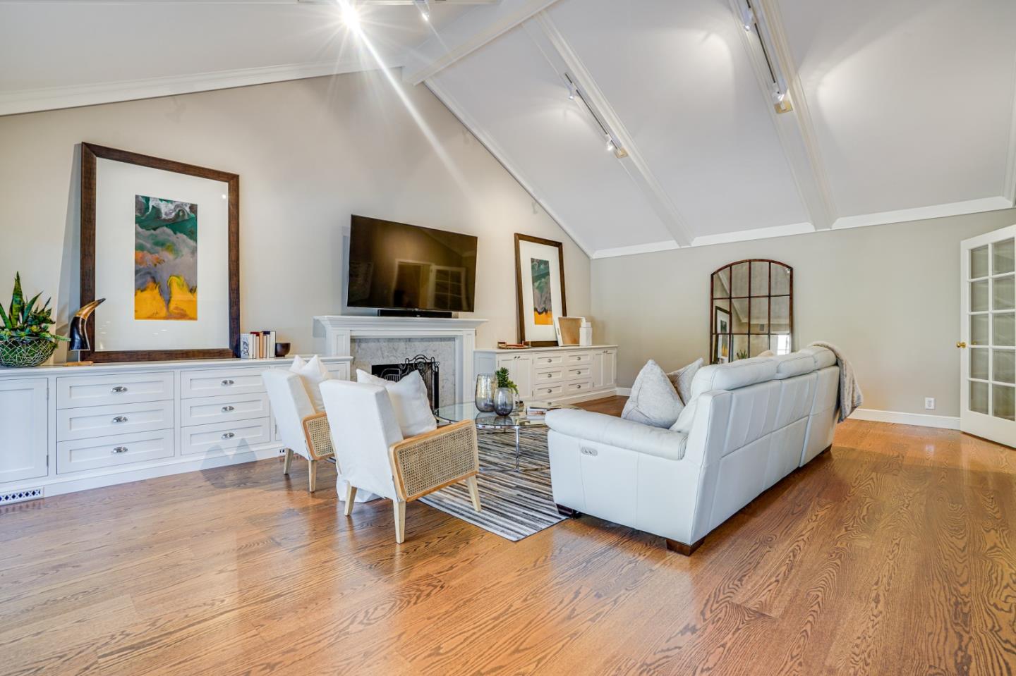 15 Joyce Road Hillsborough, CA 94010 - Photo 26 of 70 a living room with furniture and a flat screen tv