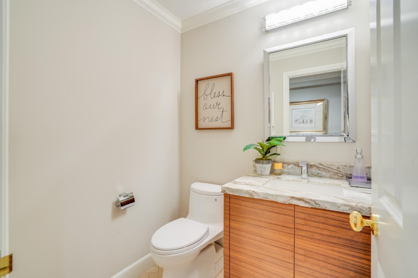 15 Joyce Road Hillsborough, CA 94010 - Photo 29 of 70 a bathroom with a sink toilet and mirror