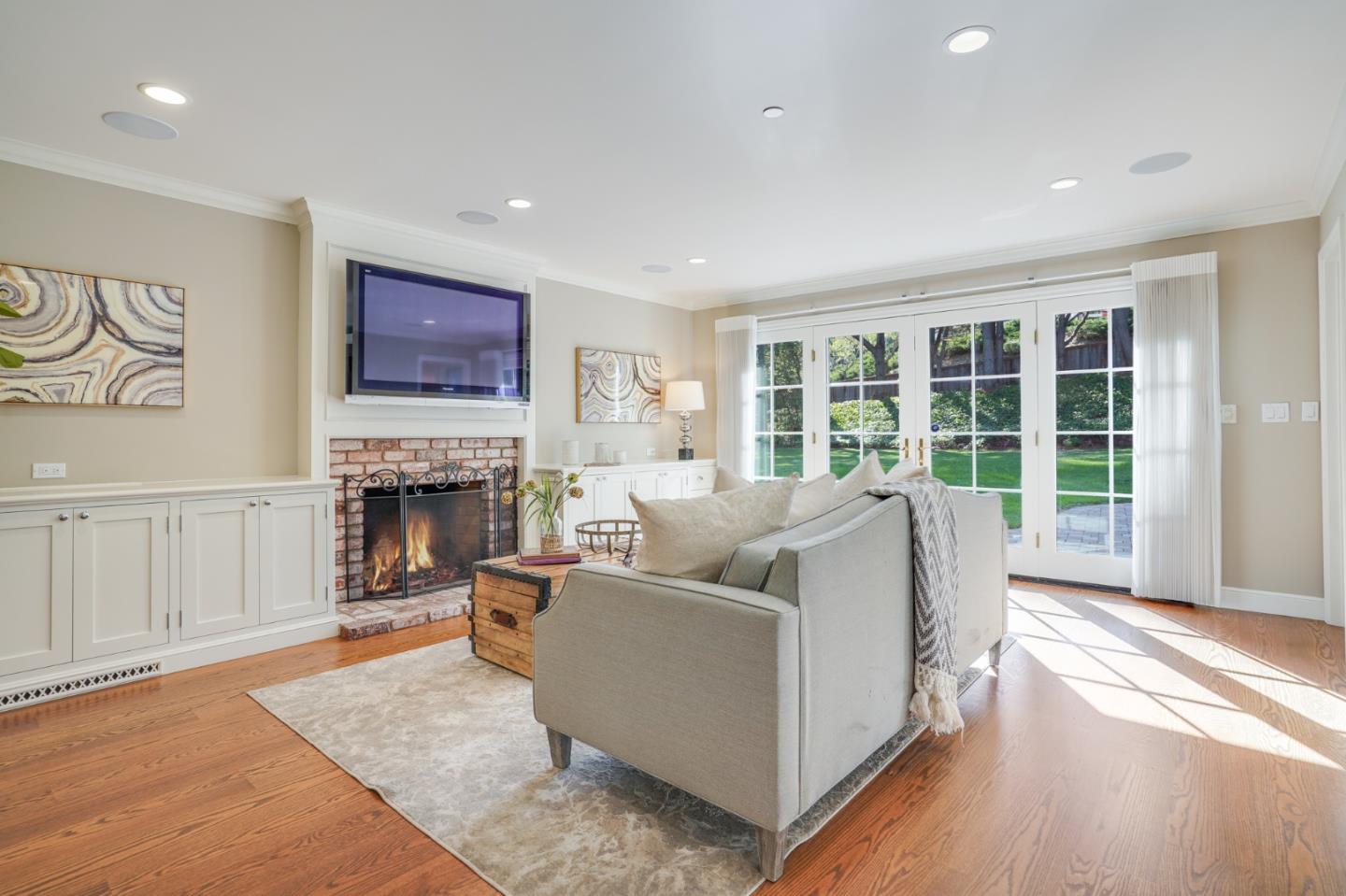 15 Joyce Road Hillsborough, CA 94010 - Photo 30 of 70 a living room with furniture and a fireplace