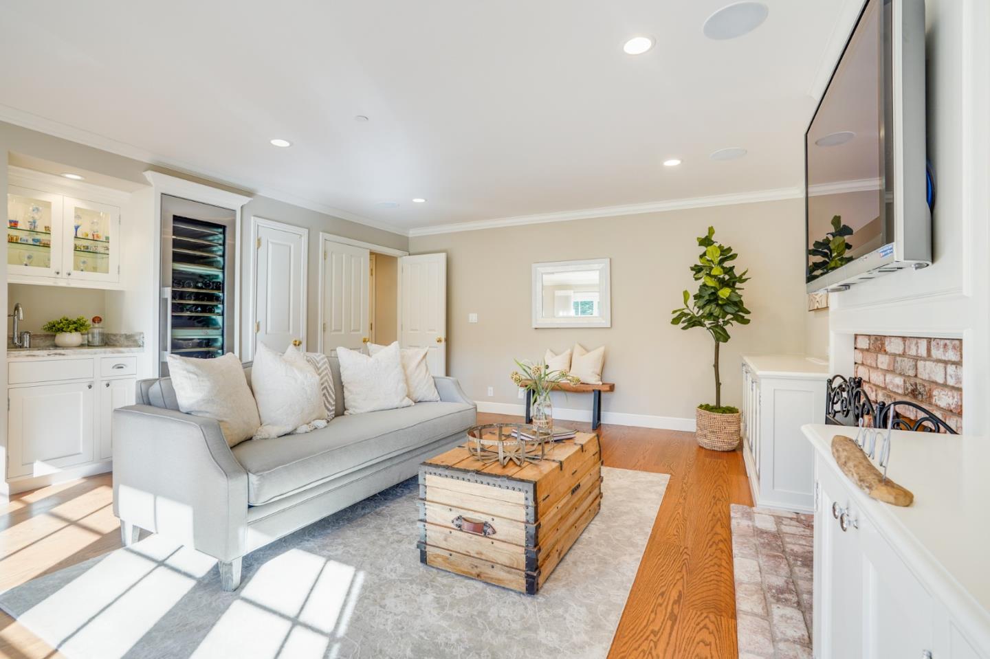 15 Joyce Road Hillsborough, CA 94010 - Photo 33 of 70 a living room with furniture fireplace and a large window