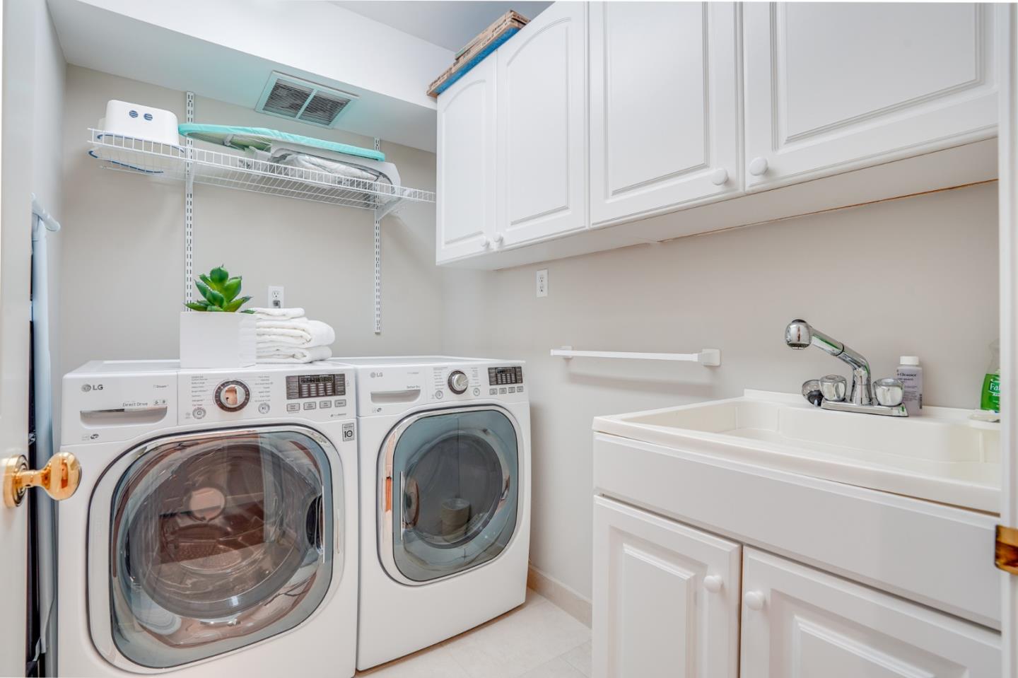 15 Joyce Road Hillsborough, CA 94010 - Photo 35 of 70 a utility room with dryer and washer