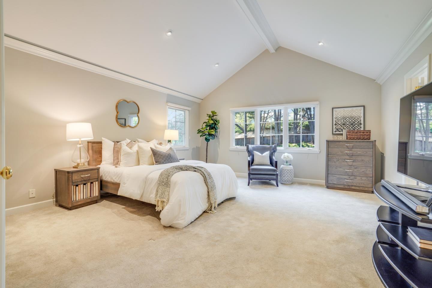 15 Joyce Road Hillsborough, CA 94010 - Photo 38 of 70 a bed room with a bed and a chair