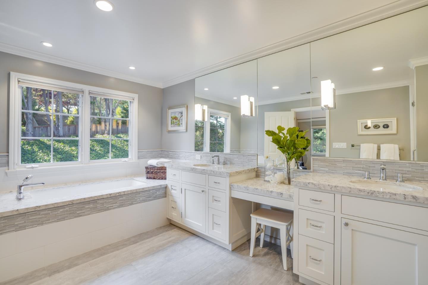 15 Joyce Road Hillsborough, CA 94010 - Photo 44 of 70 a bathroom with a granite countertop sink and a bathtub