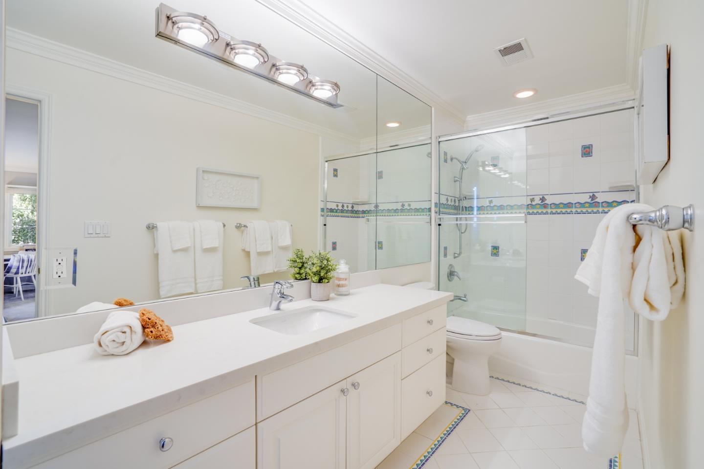 15 Joyce Road Hillsborough, CA 94010 - Photo 49 of 70 a bathroom with a double vanity sink mirror and shower