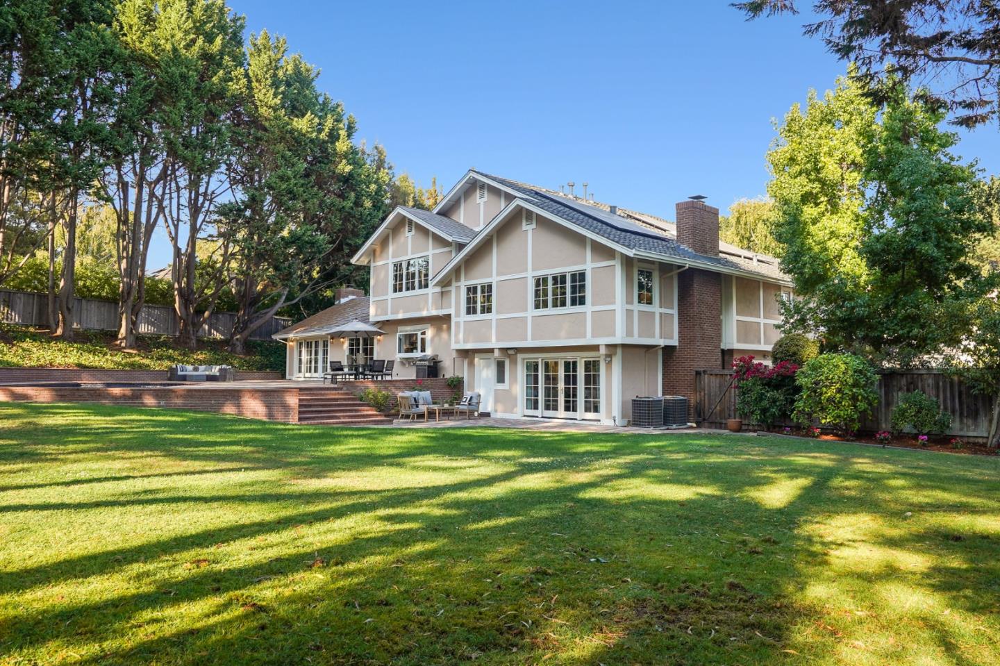15 Joyce Road Hillsborough, CA 94010 - Photo 67 of 70 a view of a house with a big yard and large trees