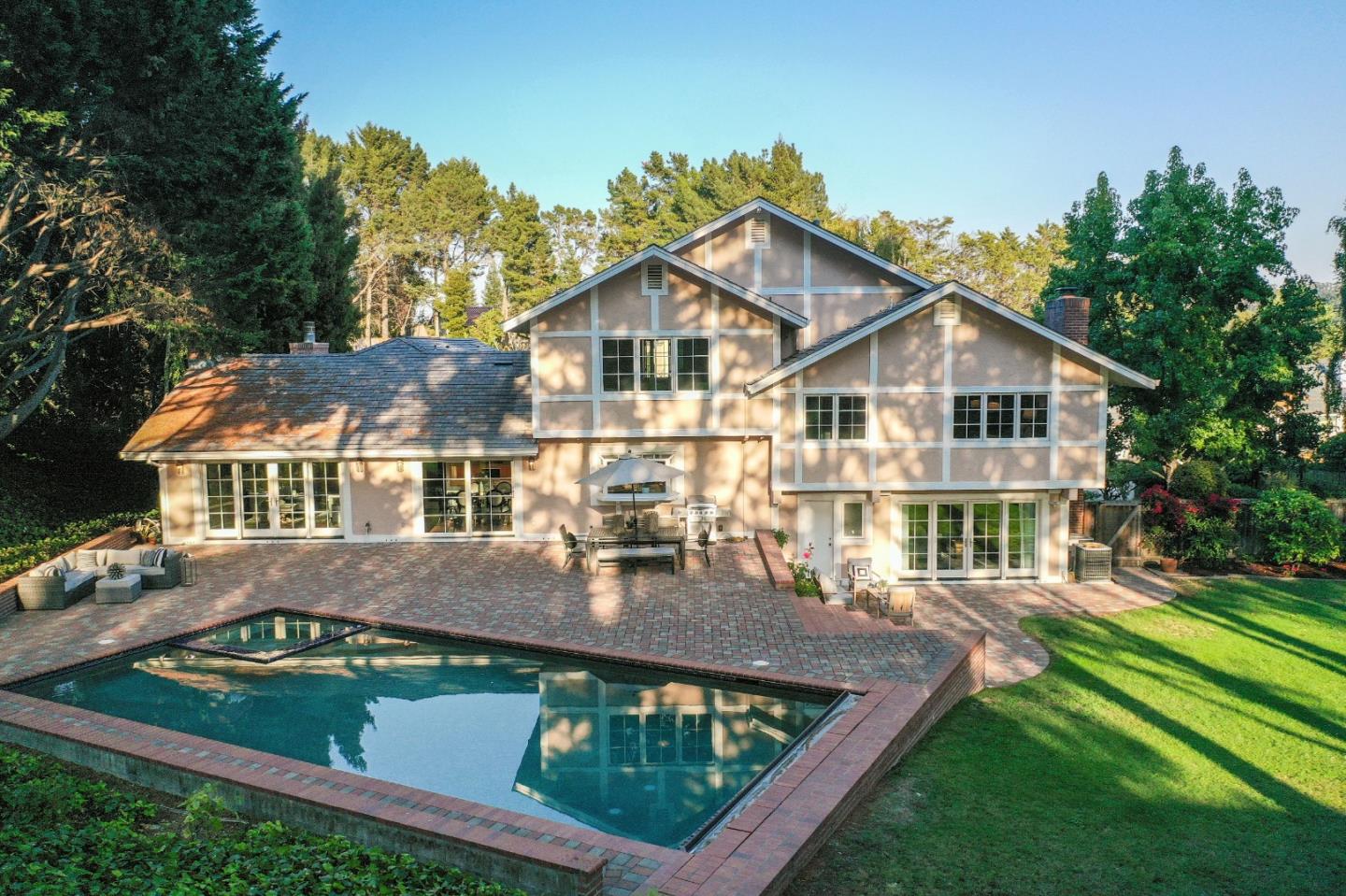 15 Joyce Road Hillsborough, CA 94010 - Photo 68 of 70 a view of a big house with a big yard plants and large trees