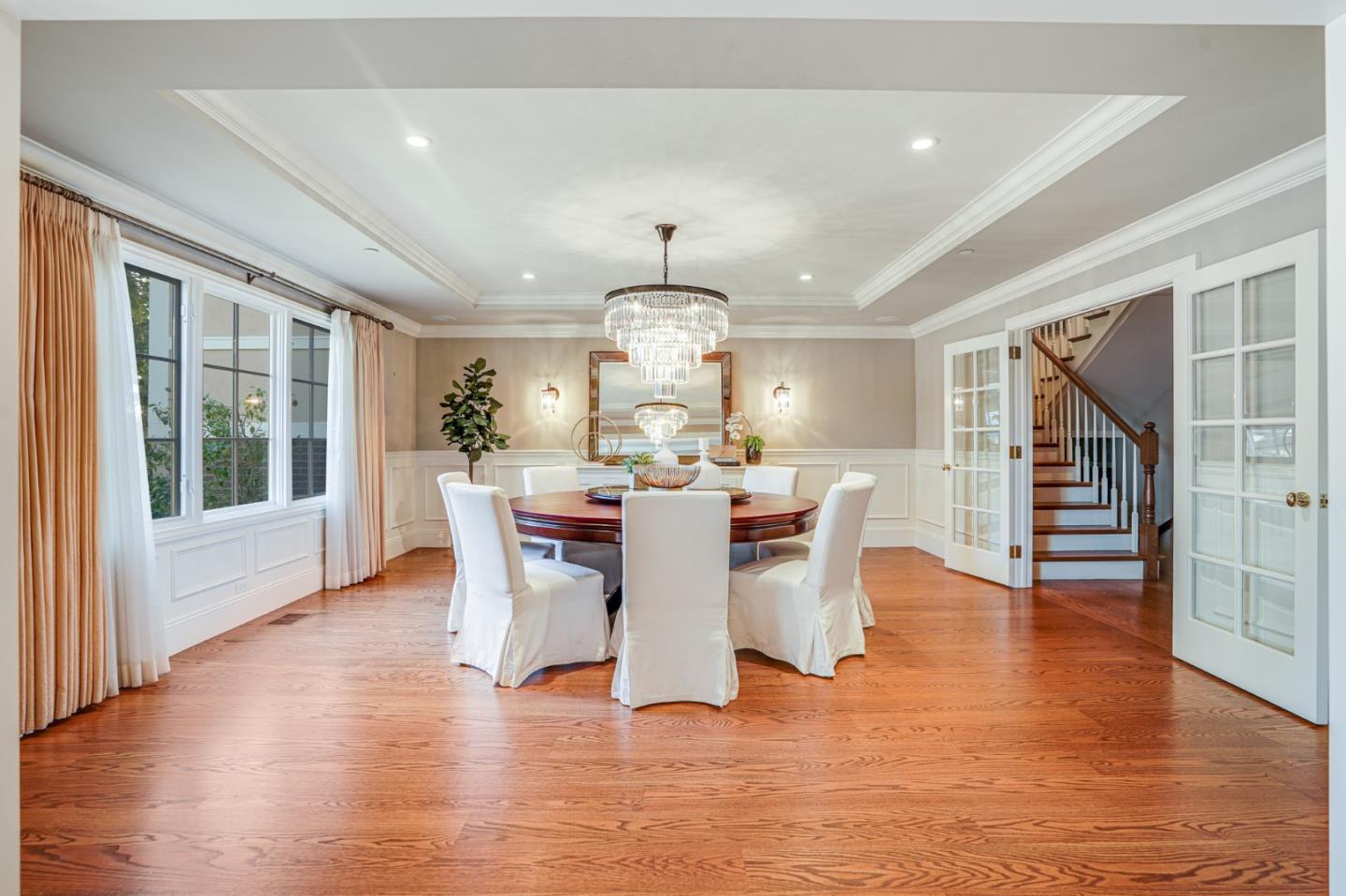 15 Joyce Road Hillsborough, CA 94010 - Photo 9 of 70 a view of a dining room with furniture and wooden floor