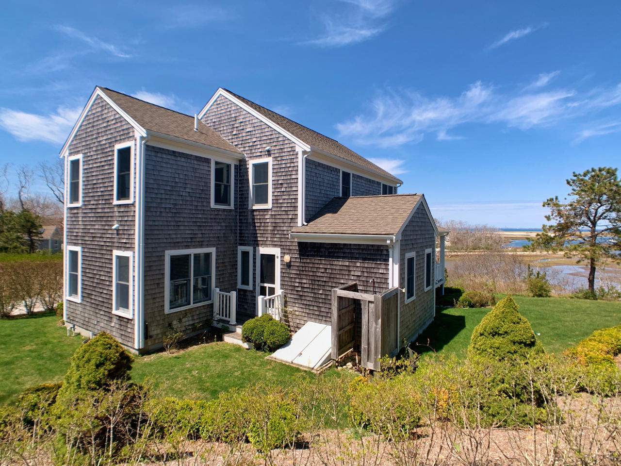 15 Mill Pond Road Truro, MA 02666 - Photo 8 of 13 front view of house with a yard