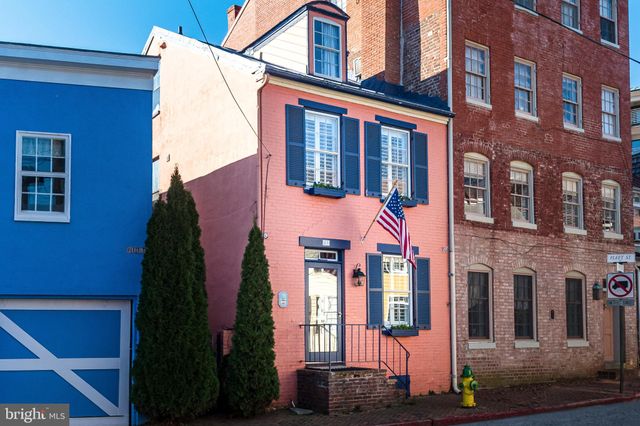 a brick building with a large windows
