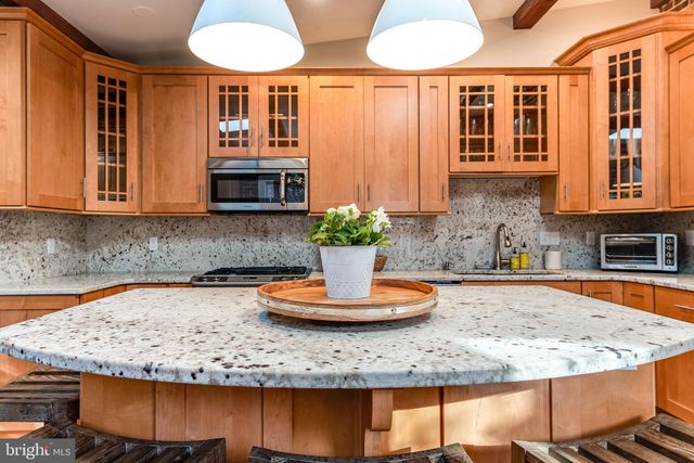 a bed room with a bed and a lamp