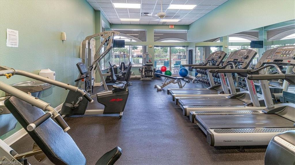 14291 Manchester Drive Naples, FL 34114 - Photo 45 of 49 a view of a room with gym equipment