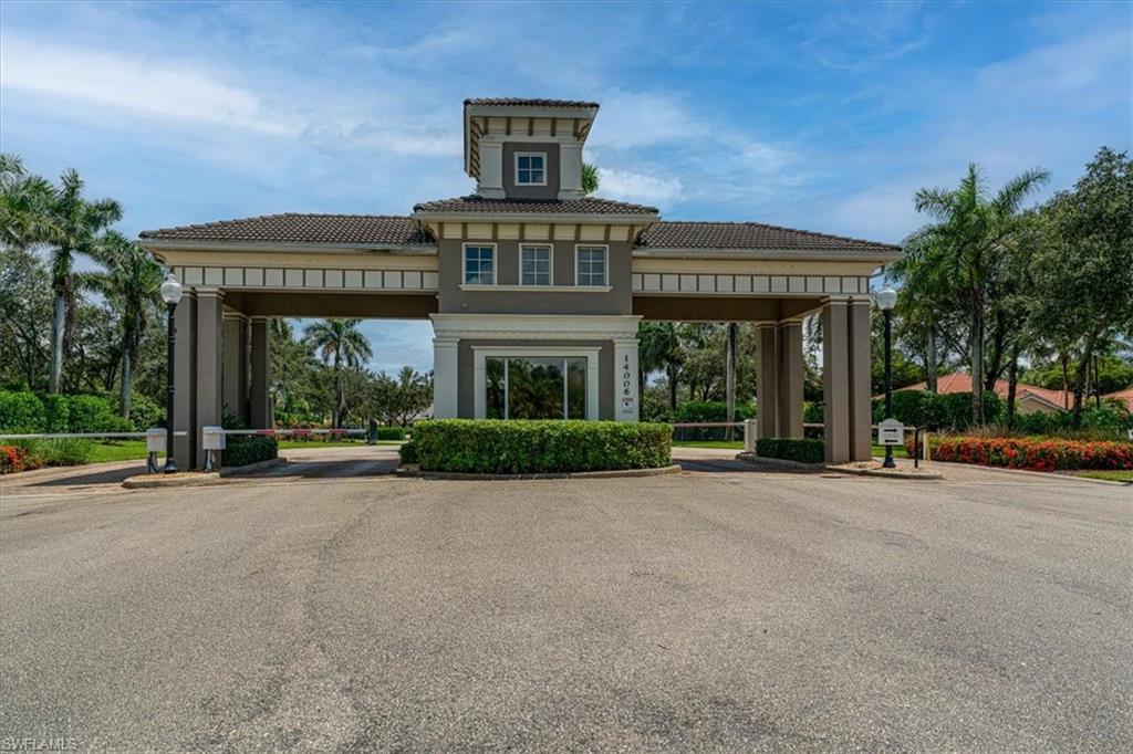 14291 Manchester Drive Naples, FL 34114 - Photo 47 of 49 front view of a house with a porch