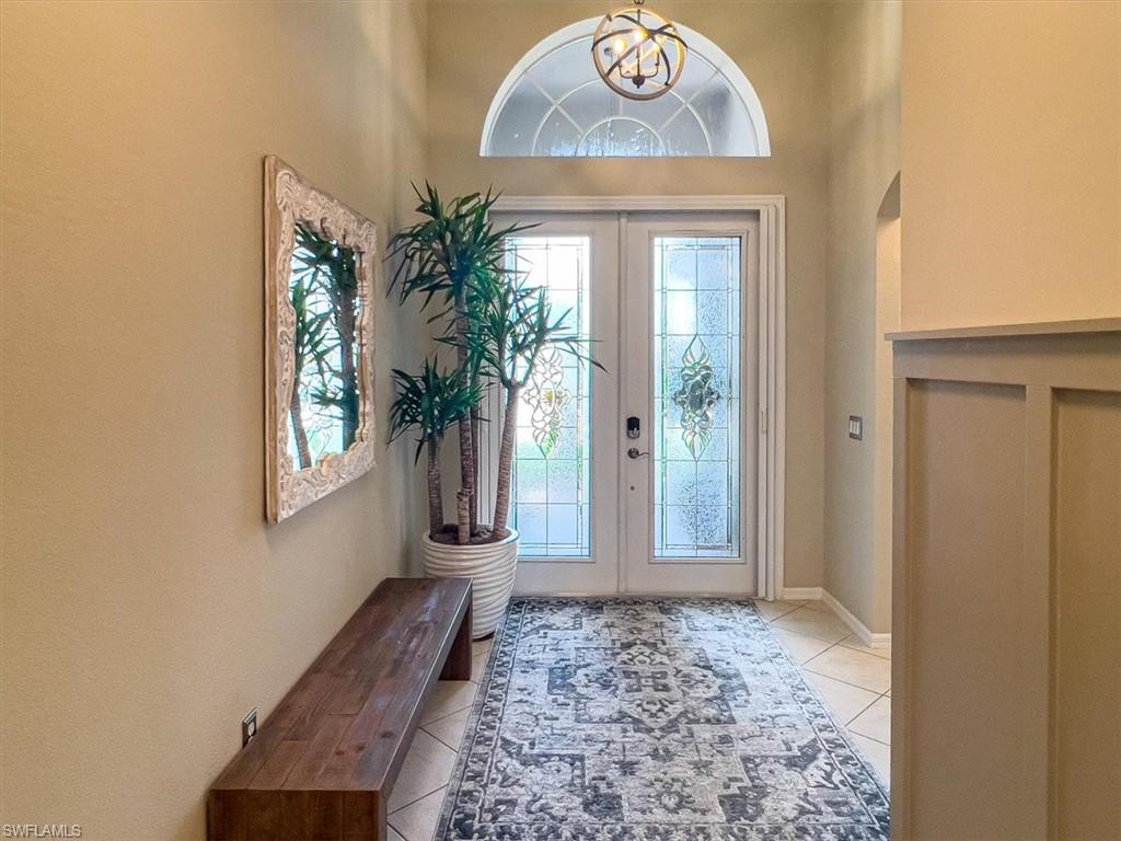 14291 Manchester Drive Naples, FL 34114 - Photo 7 of 49 a view of an entryway door
