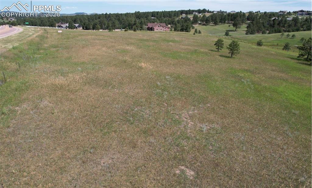16635 Dancing Wolf Way Colorado Springs, CO 80908 - Photo 14 of 29 a view of lake with lots of trees