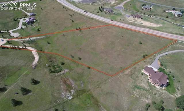 an aerial view of a highlighted house