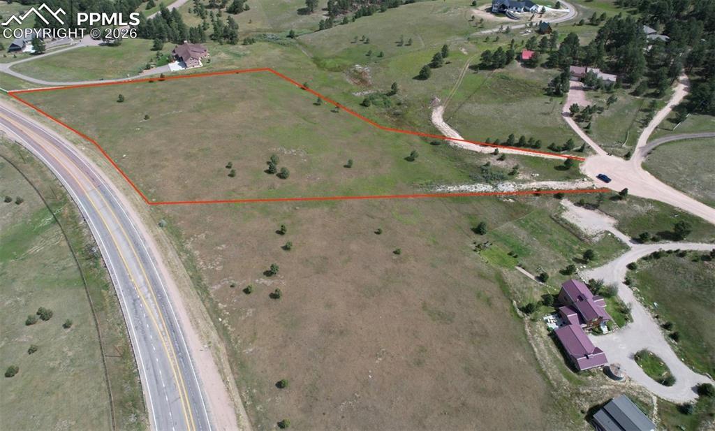 16635 Dancing Wolf Way Colorado Springs, CO 80908 - Photo 5 of 29 an aerial view of a highlighted house