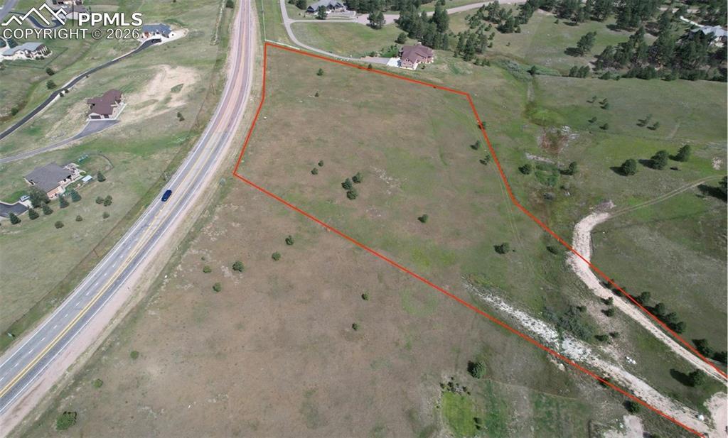 16635 Dancing Wolf Way Colorado Springs, CO 80908 - Photo 7 of 29 an aerial view of a house