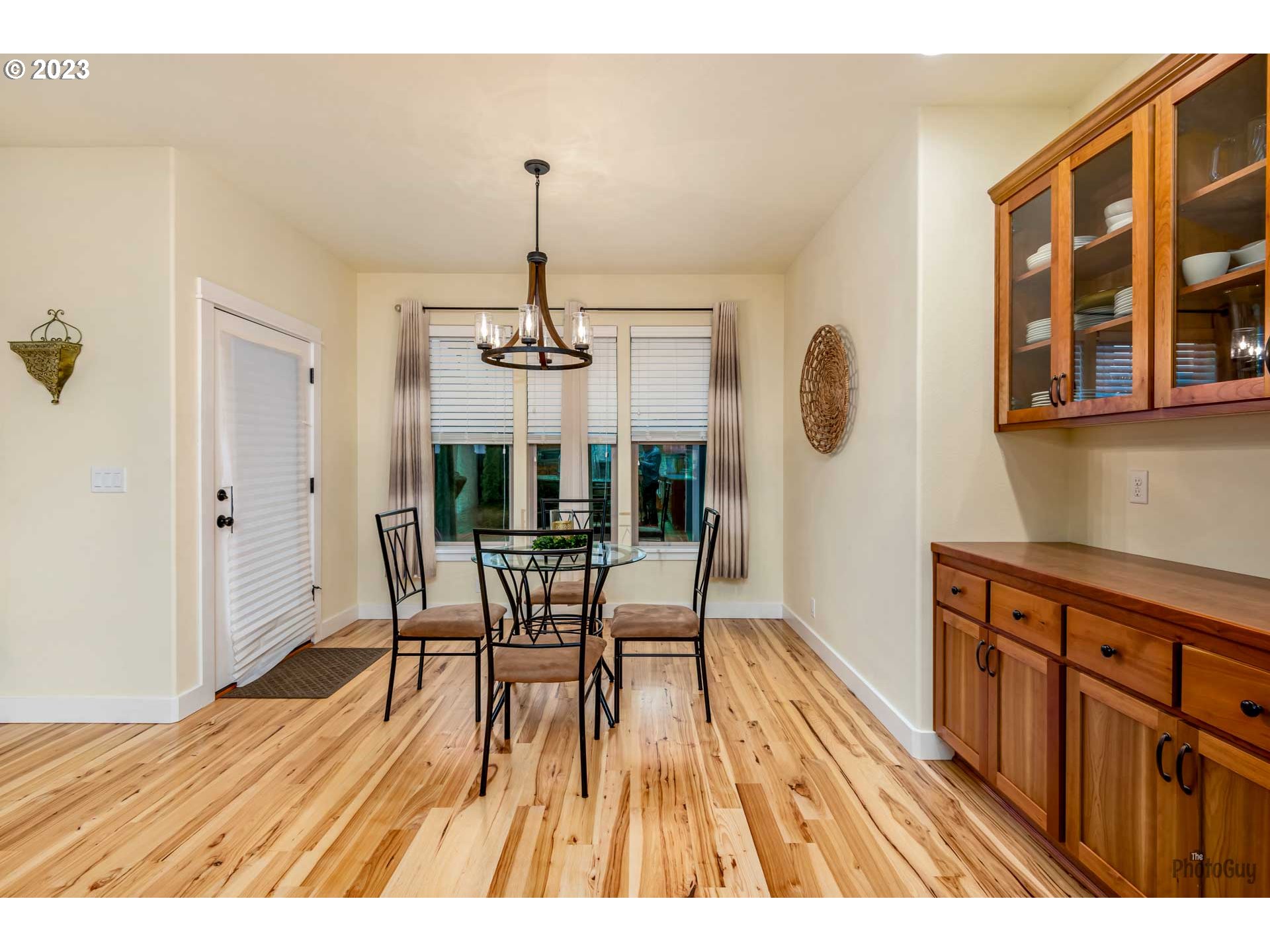 975 Riverstone Lane Springfield, OR 97477 - Photo 13 of 27 a dining room with furniture and chandelier