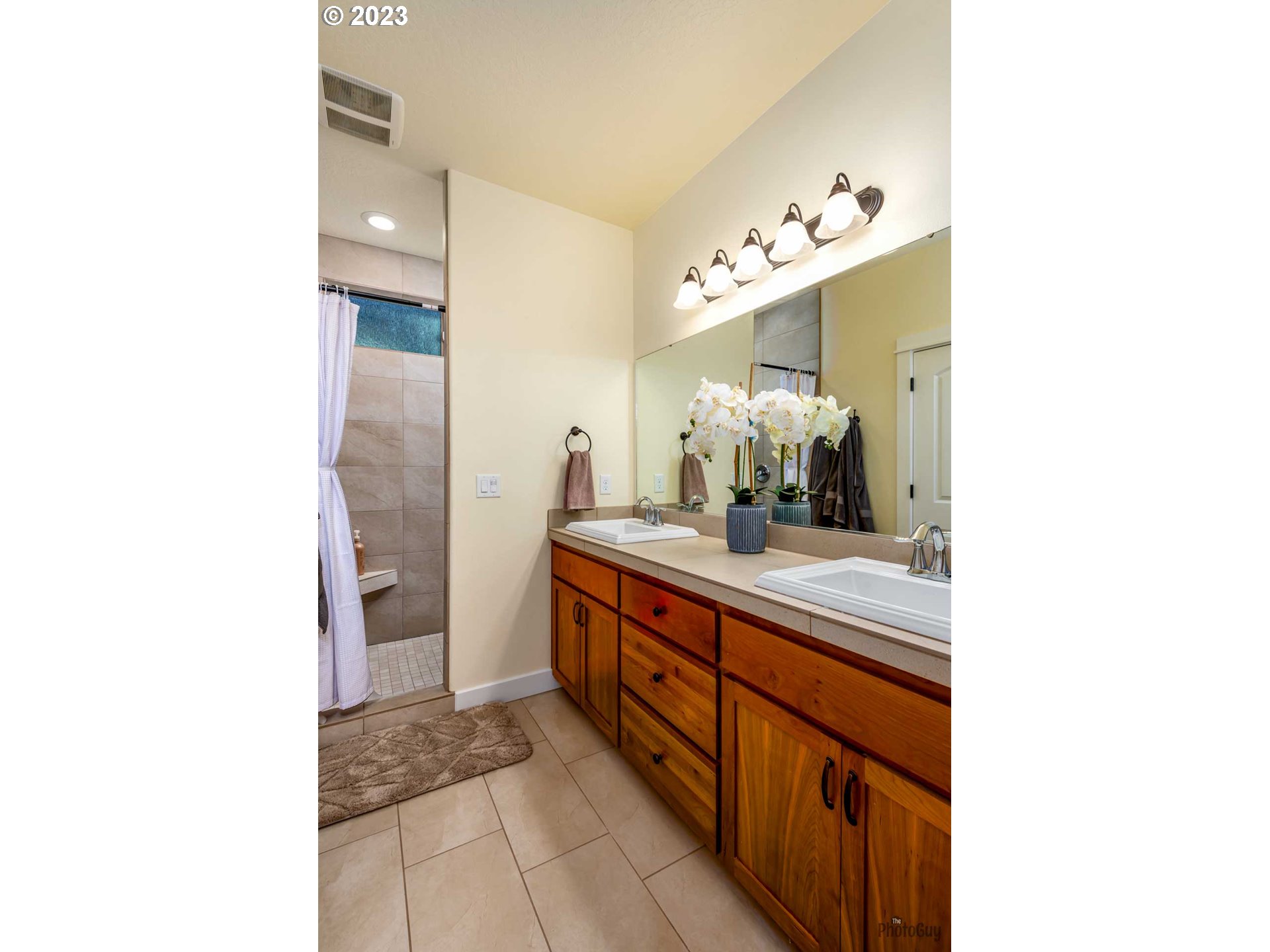 975 Riverstone Lane Springfield, OR 97477 - Photo 16 of 27 a bathroom with a sink and a mirror