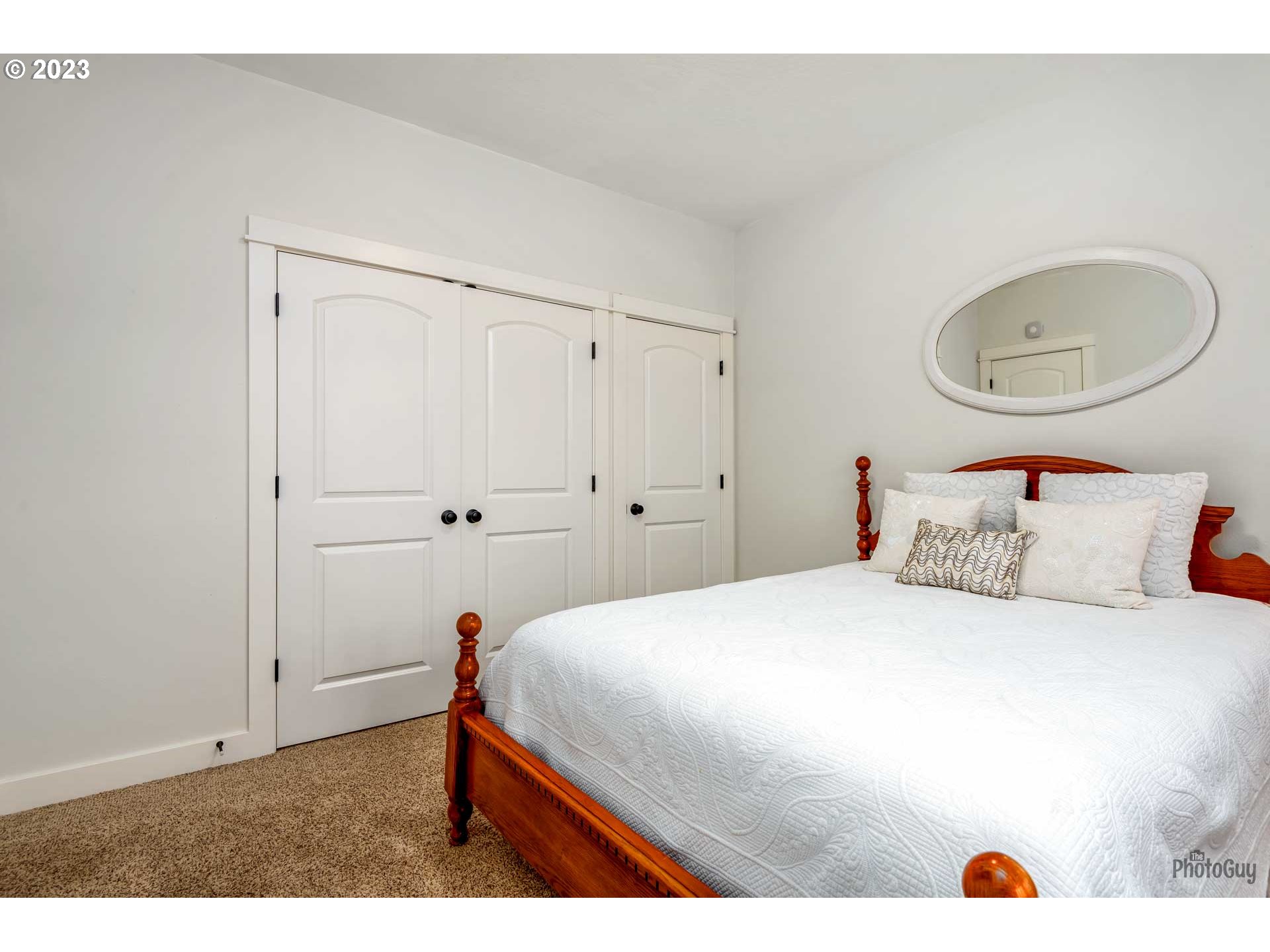 975 Riverstone Lane Springfield, OR 97477 - Photo 18 of 27 a bedroom with a bed and a dresser